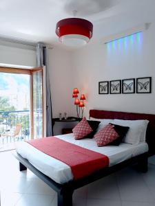 Postel nebo postele na pokoji v ubytování MaLu' B&B