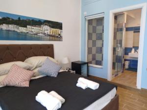 Postel nebo postele na pokoji v ubytování Casa Vacanze Riva Destra