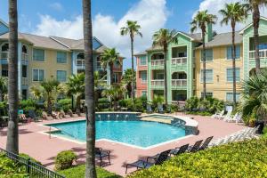 an image of a swimming pool at a resort at The Dawn Condominiums in Galveston