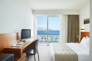 TV a/nebo společenská místnost v ubytování Lucy Hotel