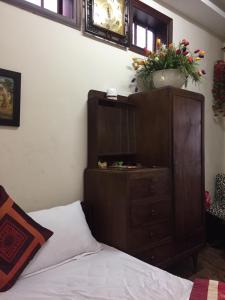 Postel nebo postele na pokoji v ubytování Villa Du lịch HUY HOÀNG