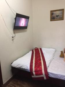 Postel nebo postele na pokoji v ubytování Villa Du lịch HUY HOÀNG