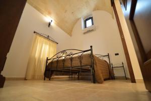 Giường trong phòng chung tại Antica Oria