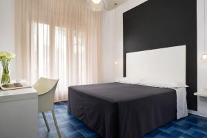TV a/nebo společenská místnost v ubytování Hotel La Playa