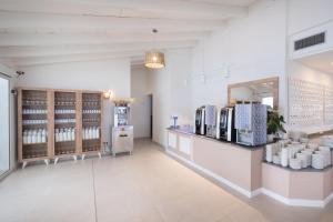 a large room with aasteryasteryasteryasteryasteryasteryasteryasteryasteryasteryastery at FERGUS Style Carema Beach in Cala en Bosc