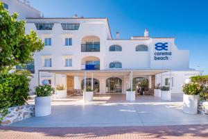 a rendering of the entrance to the coral beach hotel at FERGUS Style Carema Beach in Cala en Bosc
