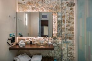 Kúpeľňa v ubytovaní Ambassadors Residence Boutique Hotel + 37 fotografií