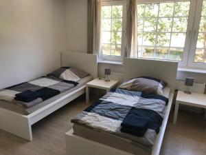 Voodi või voodid majutusasutuse Borstel - Alte Schmiede toas