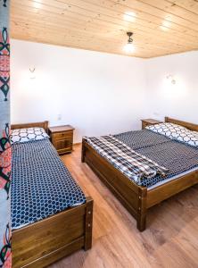 מיטה או מיטות בחדר ב-U Bochniaka
