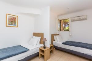 Postel nebo postele na pokoji v ubytování Kilina + 37 fotografií