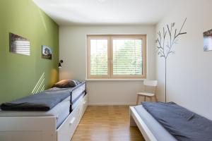 Katil atau katil-katil dalam bilik di Ferienwohnung Busch