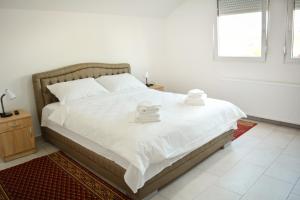 Postel nebo postele na pokoji v ubytování Deltix Apartments