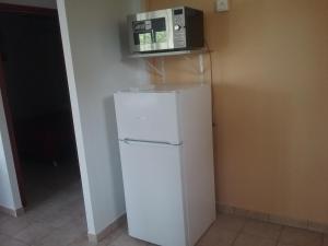 GÎTE MORINGA 주방 또는 간이 주방
