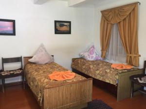 Un pat sau paturi într-o cameră la Arista Yurt Camp
