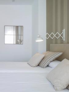Posteľ alebo postele v izbe v ubytovaní Hotel Boutique Balandret