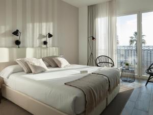 Posteľ alebo postele v izbe v ubytovaní Hotel Boutique Balandret