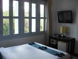 Letto o letti in una camera di The Columns