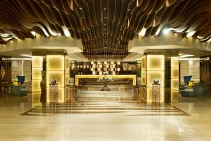 a lobby of a hotel with a bar in it at Gulf Court Hotel Business Bay in Dubai