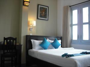 Letto o letti in una camera di The Columns