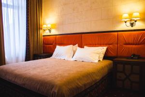 Postel nebo postele na pokoji v ubytování Hotel Mastara
