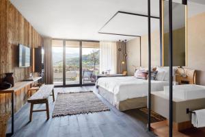 Posteľ alebo postele v izbe v ubytovaní Hotel Löwenhof