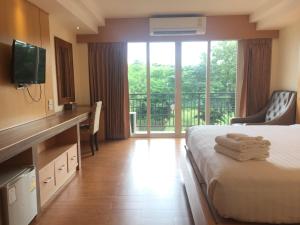 Μια τηλεόραση ή/και κέντρο ψυχαγωγίας στο Kitlada Hotel Udonthani