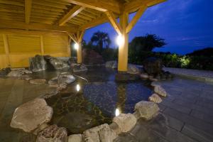 حديقة خارج Hotel Izukyu
