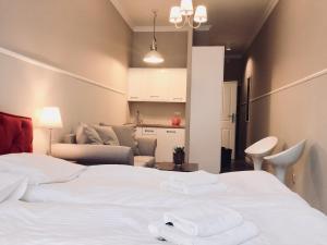 Posteľ alebo postele v izbe v ubytovaní Apartamenty Międzyzdroje