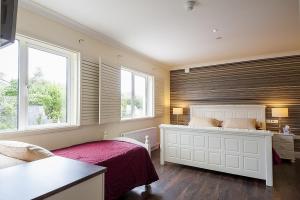 Postel nebo postele na pokoji v ubytování Sea Breeze Lodge B&B Galway