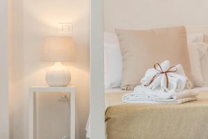 Ein Bett oder Betten in einem Zimmer der Unterkunft Di Lorenzi Albergo Diffuso