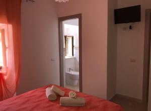 A bed or beds in a room at B&B Adele