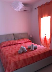 A bed or beds in a room at B&B Adele