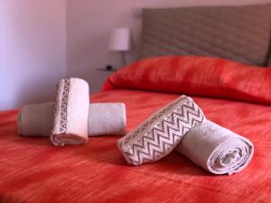 A bed or beds in a room at B&B Adele