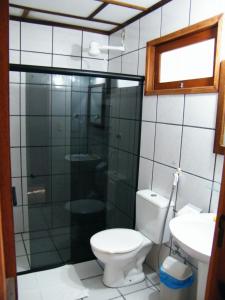 Koupelna v ubytování Pousada Igarakuê Flat