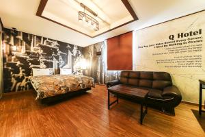 Posteľ alebo postele v izbe v ubytovaní Q Hotel Yongin