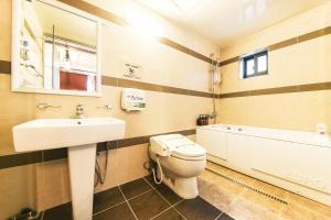 Kúpeľňa v ubytovaní Q Hotel Yongin