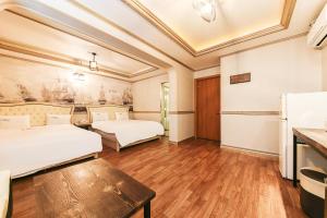 Posteľ alebo postele v izbe v ubytovaní Q Hotel Yongin