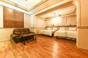Posteľ alebo postele v izbe v ubytovaní Q Hotel Yongin