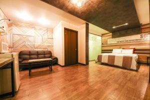 Posteľ alebo postele v izbe v ubytovaní Q Hotel Yongin