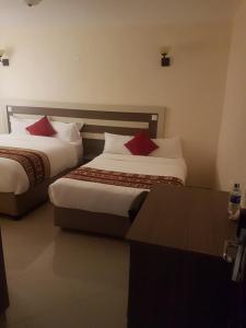 Cama ou camas em um quarto em Mara Frontier Hotel