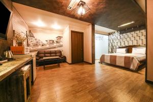 Posteľ alebo postele v izbe v ubytovaní Q Hotel Yongin