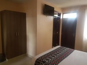 Mara Frontier Hotel客房内的一张或多张床位