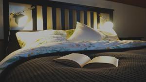 Ein Bett oder Betten in einem Zimmer der Unterkunft Ubytovanie&Reštaurácia Bodliak