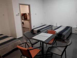 A seating area at Kertvárosi Apartman II