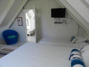 Postel nebo postele na pokoji v ubytování Ocean View Sai