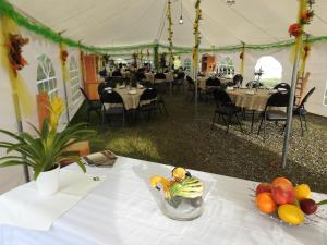 a table with a bowl of fruit on top of a tent at WildExodus Outdoors in Timmins