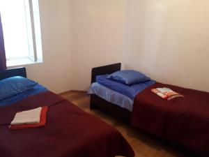 Postel nebo postele na pokoji v ubytování Guesthaus King Seti
