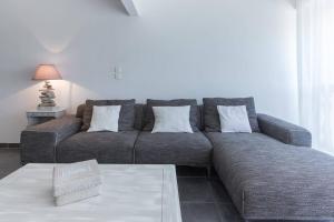 Ένα ή περισσότερα κρεβάτια σε δωμάτιο στο La Conque du Trou d'eau