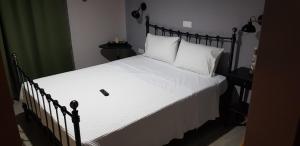 A bed or beds in a room at Villanta