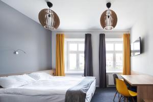 Łóżko lub łóżka w pokoju w obiekcie Polin House